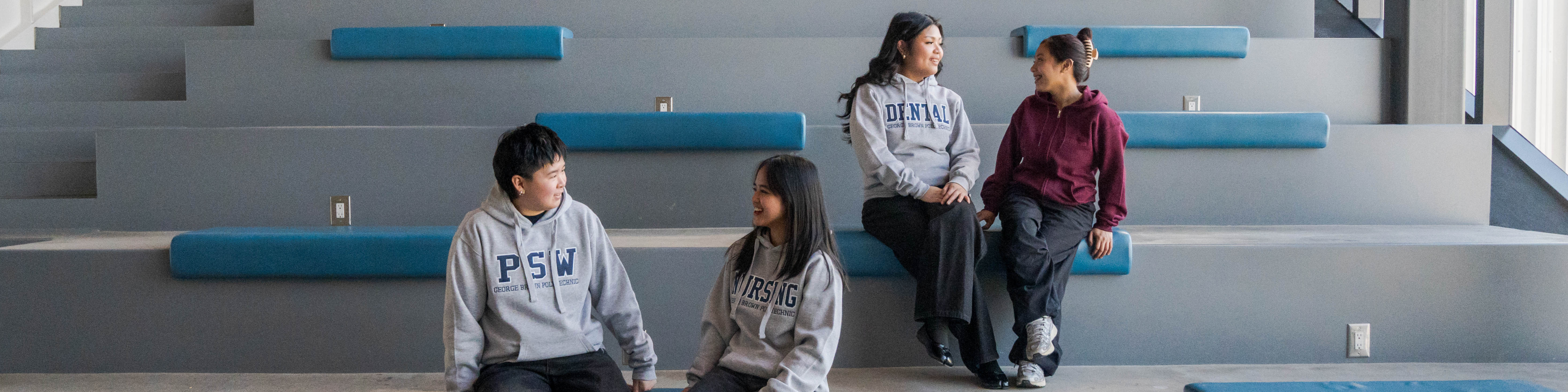 Four students sitting together